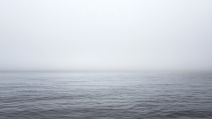 A foggy day with a calm ocean