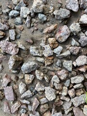 Natural crushed stone and sand texture close-up