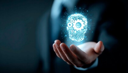 Businessman holding virtual holographic head icon with gears on dark background, technology concept for artificial intelligence, business services, computer network system or software product developm