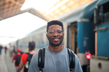 young man in a train station