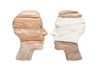 Abstract wooden faces representing human connection, communication, and duality in art, nature, and emotion exploration