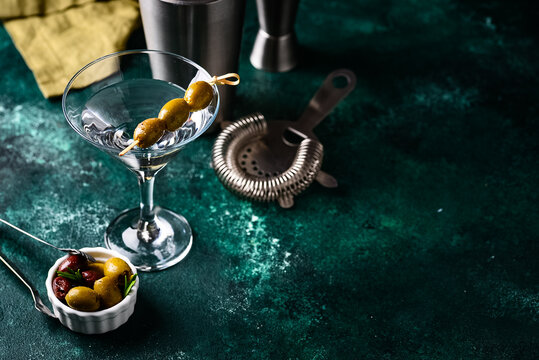 Traditional martini cocktail with olives and
