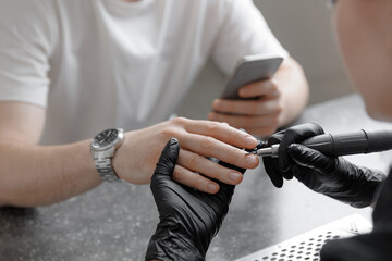 Trendy manicure techniques for young caucasian males