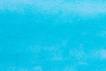 artistic backdrop: close up of canvas stained with light blue paint