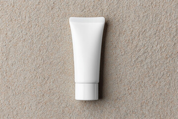 White Cosmetic Tube on Beige Background Clean Beauty Concept