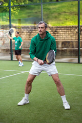 Padel athlete during intense rally great visual for online and print campaigns