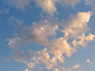 Golden and Grey Clouds in a Blue Sky