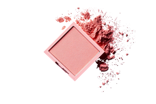 A square-shaped pink blush compact lying on its side, with powder dust scattered around it, set against a white isolated on a transparent background in PNG format.