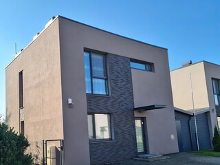 Modern luxury villa exterior in minimal scandinavian style, 3d render
