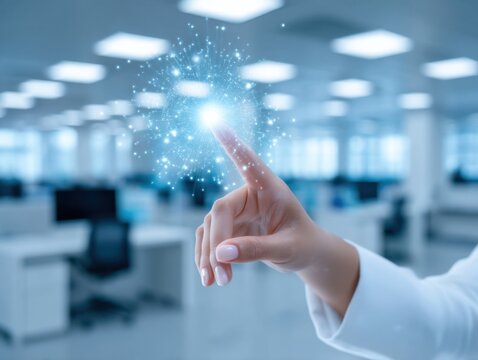 A hand is touching a glowing digital network interface in a modern office environment.