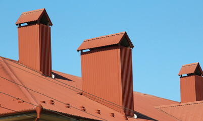 Chimney on the roof of the house.