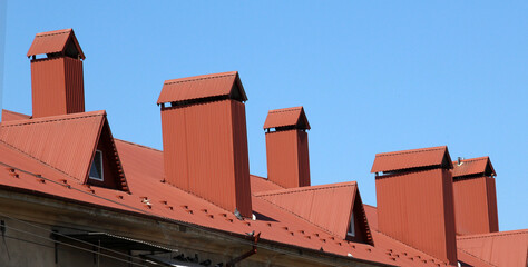 Chimney on the roof of the house.