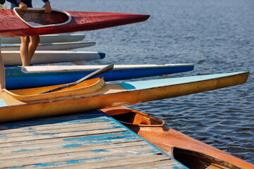 Kayaks at Dock Ready for Water Sports Training School Competitions and Summer Recreation Activities