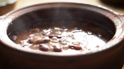 Cooking delicious kidney beans in a clay pot traditional recipe for a hearty and flavorful meal