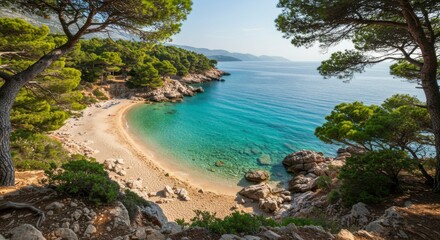 Scenic coastal view, with a pristine sandy beach, clear turquoise water, and lush greenery