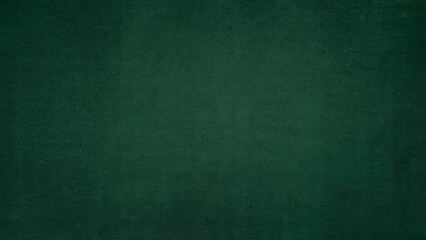 A deep textured emerald green background with subtle variations in shade and a slightly rough surface perfect for design
