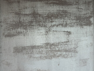 Rough rustic cement wall texture background with weathered finish