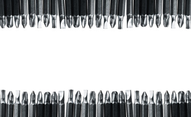 Many screwdriver bits, cross screwdrivers, flat screwdrivers, etc., with white background and empty...