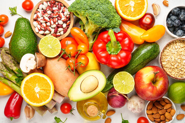 Healthy food assortment on white background.