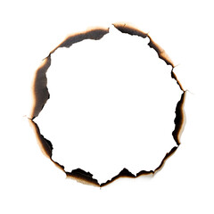 A round hole burned in white paper is isolated on transparent background