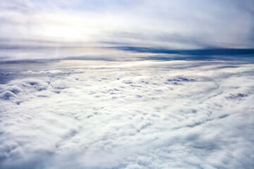 Stratiform clouds. Aerial view of fluffy white blanket cloud stretching across sky