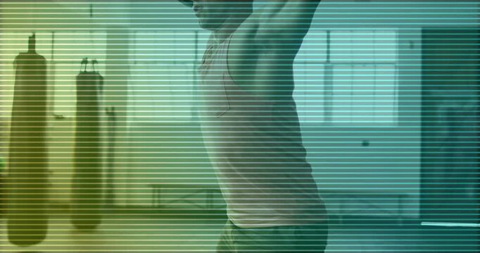 Man finishing stretch in gym starting animated barbell icon before doing overhead squat for warmup