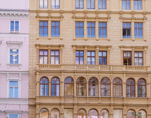 Fototapeta premium Historic facade of Vienna residential building with decorative windows