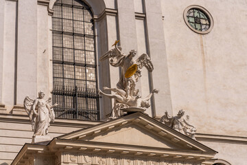 Baroque angelic sculpture on church facade in Vienna