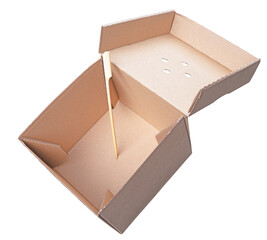 Disposable open hamburger carton with stick on isolated background.