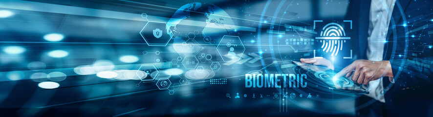 Businessman using tablet analyzing biometric data for enhanced security, employee authentication,...