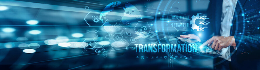 Businessman using tablet analyzing digital transformation strategies to enhance business efficiency, drive innovation, improve customer experience, achieve sustainable growth in a competitive market.