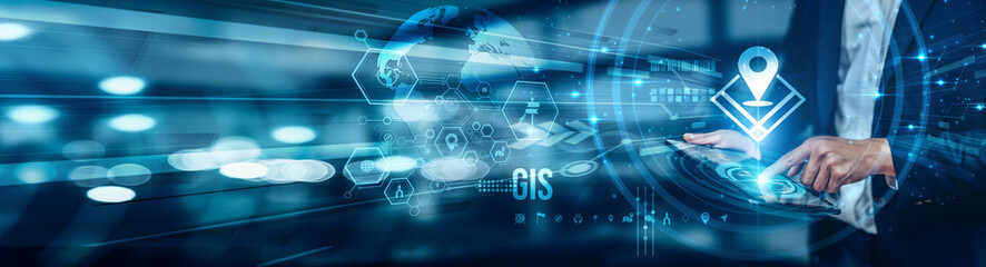 Businessman using tablet analyzing GIS data trends to monitor spatial patterns, geographic distribution, infrastructure planning, environmental impact, resource management, and urban development.