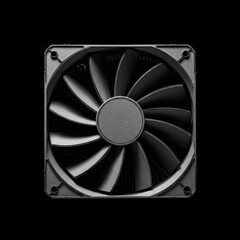 Close up of a modern dark grey computer cooling fan with curved blades against a solid black background
