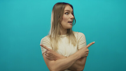 Woman gestures happily pointing both ways against a vibrant green backdrop conveying indecision and...