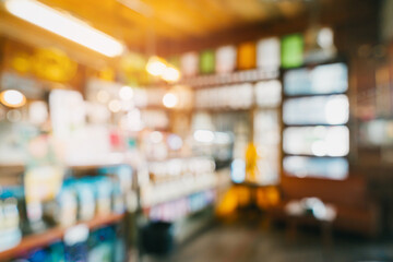 Blurred Background of a Cozy Coffee Shop with Wooden Decor and Warm Lighting Atmosphere