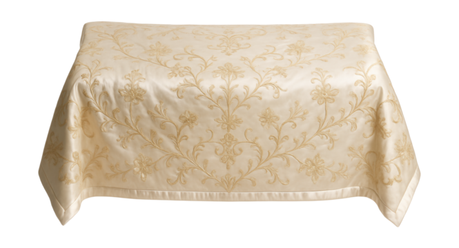 A decorative silk bedspread with hand-embroidered patterns, offering a touch of luxury and refinement for a guest suite.