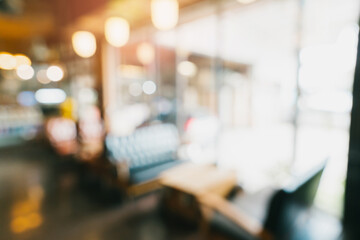 Blurred Background of Cozy Cafe Interior with Soft Lighting and Comfortable Seating Arrangements