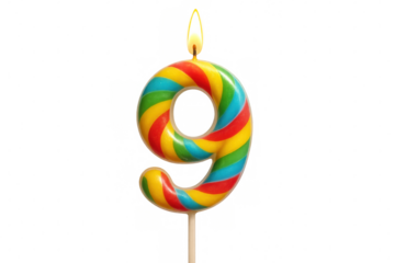 Glowing golden birthday candle number nine illuminating transparent surface, celebrating ninth year milestone