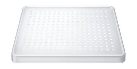 A perforated plastic shelf for a refrigerator, allowing air circulation for fresh produce in an apartment kitchen.