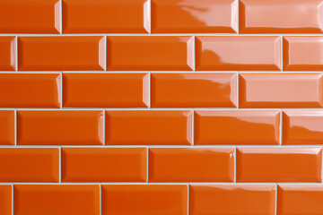 Glossy orange ceramic brick tiles wall pattern, modern interior design, symmetrical pattern