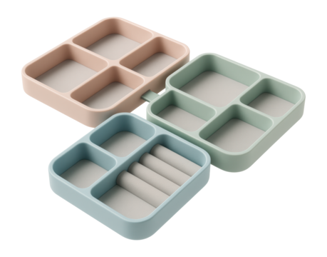 A set of interlocking plastic trays for organizing jewelry in a bedroom vanity.