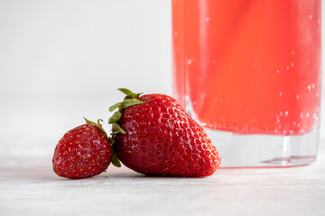 Organic strawberries and strawberry iced sodas.