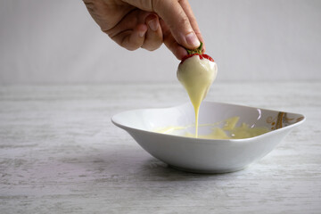 White chocolate covered organic strawberries.