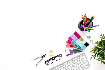 Decorator workspace flat lay. Creative designers table with color paint swatches