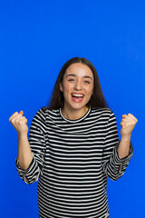 Happy joyful woman celebrating success victory, winning birthday, lottery jackpot goal achievement...