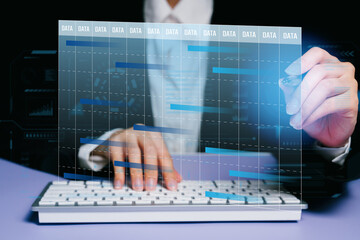 Business Professional Analyzing Data Trends with Virtual Graphs on Keyboard in Modern Office Setting