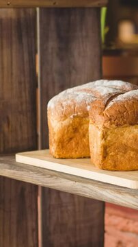 Animation of bread loafs on shelves in schop
