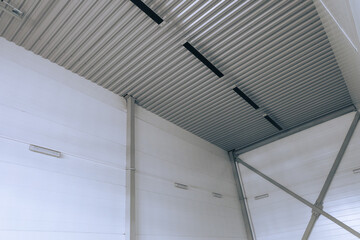Corrugated ceiling sheet and indoors structures of a cargo garage