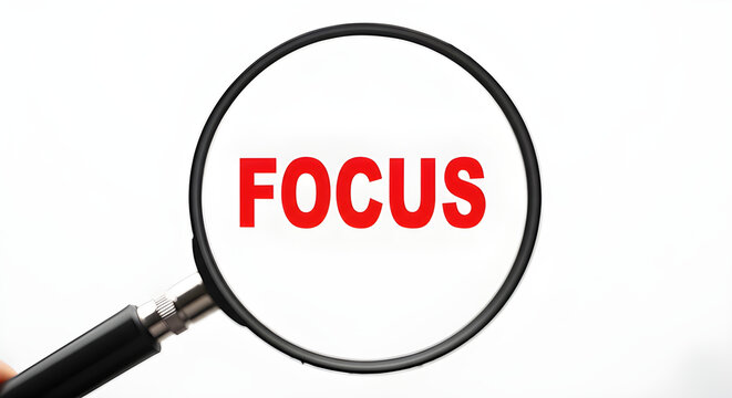A magnifying glass focuses on the word 'focus', emphasizing the core concept.