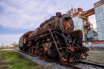 Old rusty abandoned steam locomotive